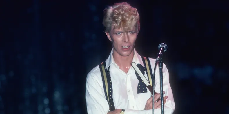 1983 David Bowie - Striped Braces, Polka dot bow tie png.png